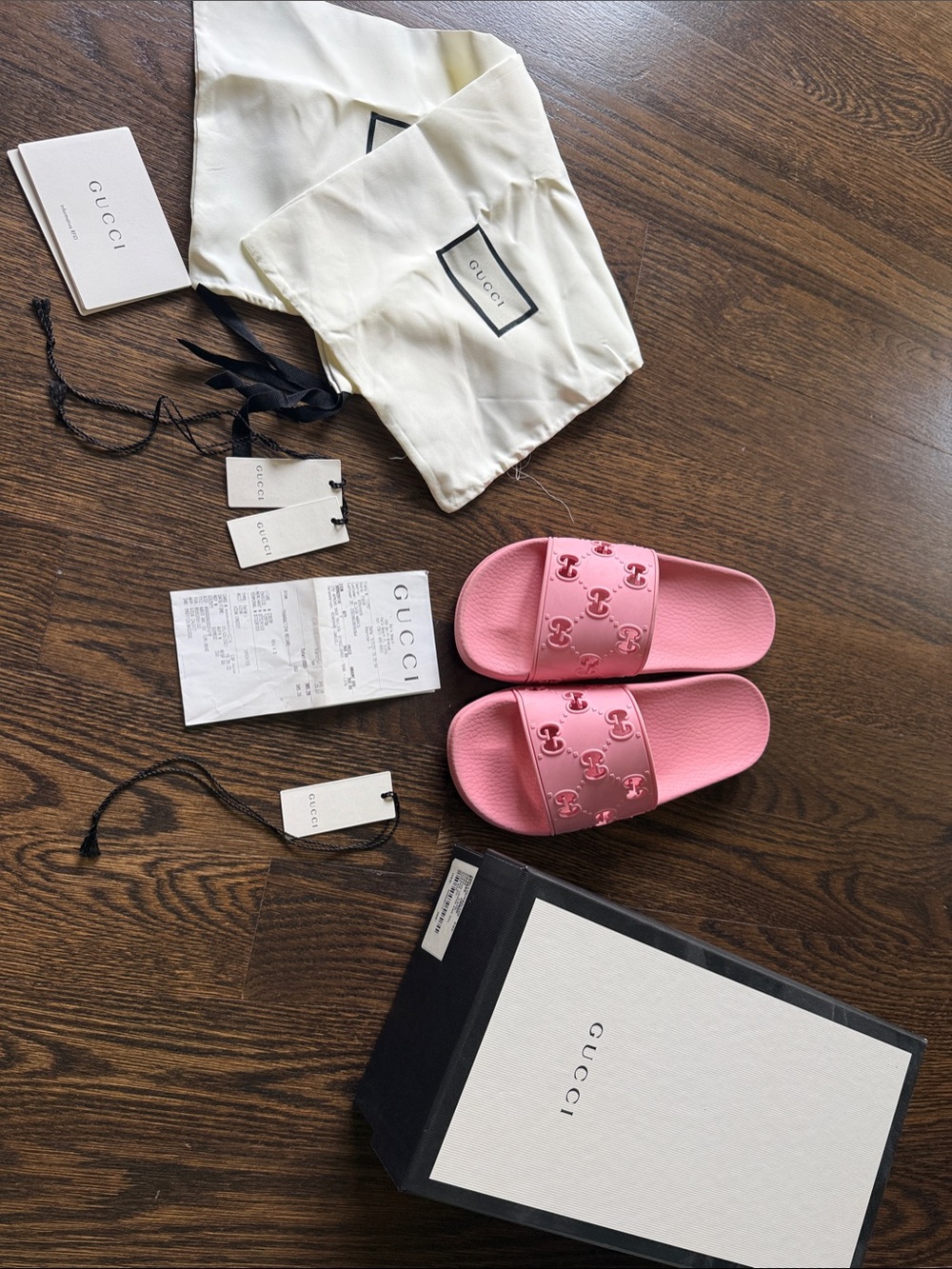 Gucci Pink Embossed GG Slide Sandals